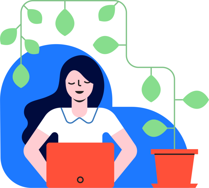 kvinna som är introvert arbetar framför en laptop omgiven av en stor växt