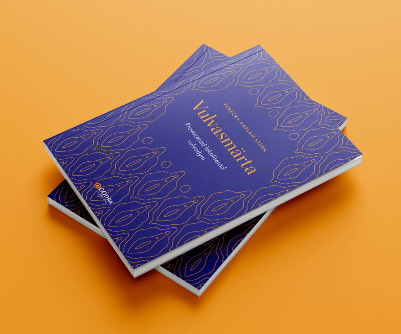 Två böcker av boken "Vulvasmärta" som ligger på ett orange underlag.