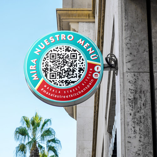 Restaurant cafe circular sign with a QR code for an Indian street food Restaurant in Spain