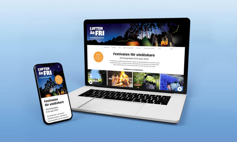 Bilden föreställer en dator och mobiltelefon med webbsidan för den fiktiva friluftsfestivalen "Luften är fri".