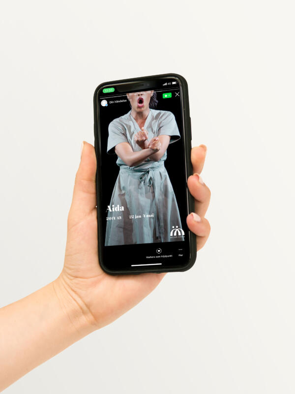 Mockup of a phone showing an Instagram story promoting Aida for Malmö Opera