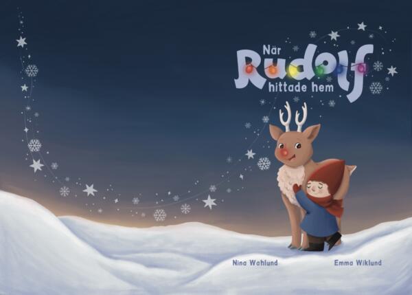 Omslagsbild till boken När Rudolf hittade hem. Renen Rudolf står i ett snölandskap och kramas av tomtenissen Julius. Över titeln hänger en ljusslinga i regnbågens färger.