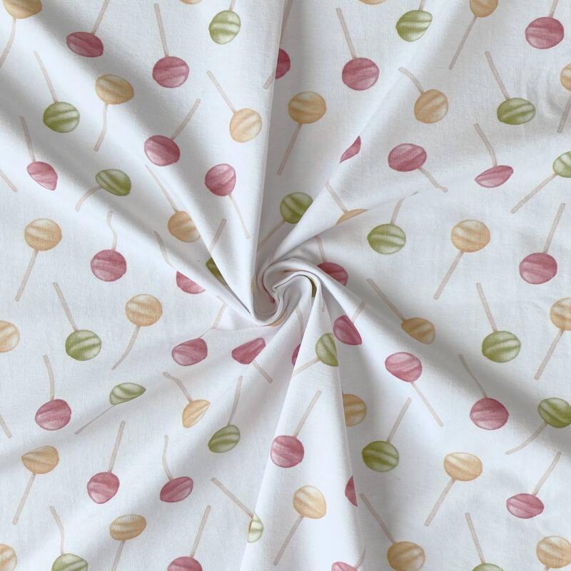 Lollipop pattern in green, pink and yellow on fabric