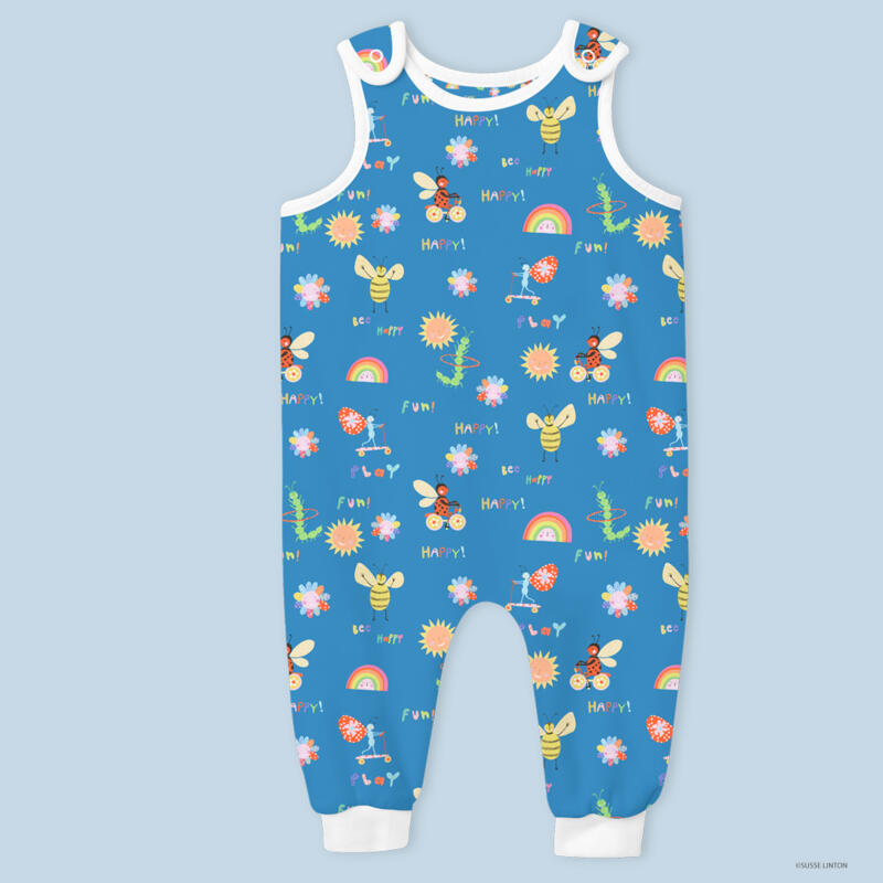 Happy-Play-Fun  pattern on a baby's play suit by illustrator Susse Linton