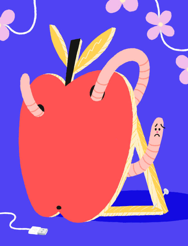 Ett äpple gjort av trä, med en besviken mask i.