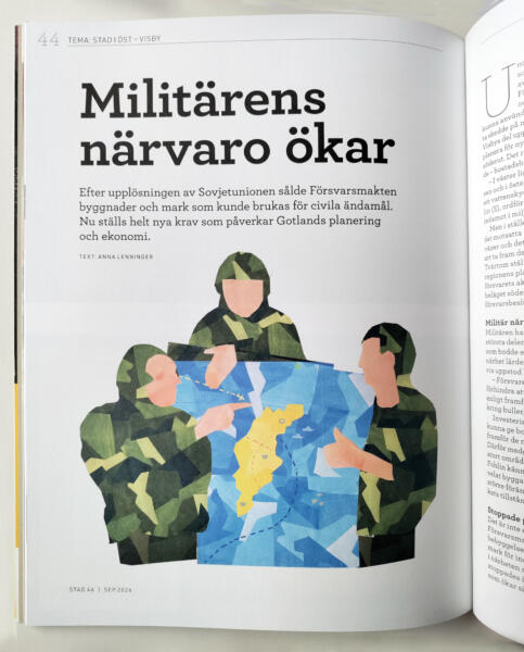 Uppslag i tidning med illustration av uniformerade personer som studerar en karta över Gotland.