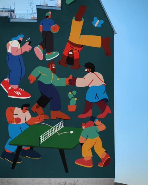 Mural of various people in a community engaging in acticities