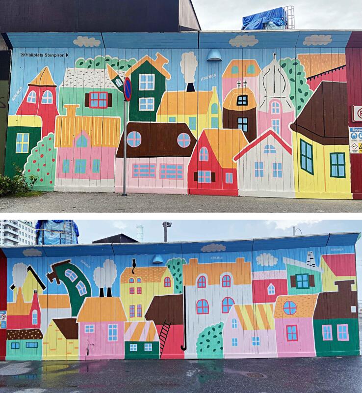 Färgglad muralmålning vid Stenpiren i centrala Göteborg. Den stora väggmålningen föreställer färgglada och fantasifulla hus.