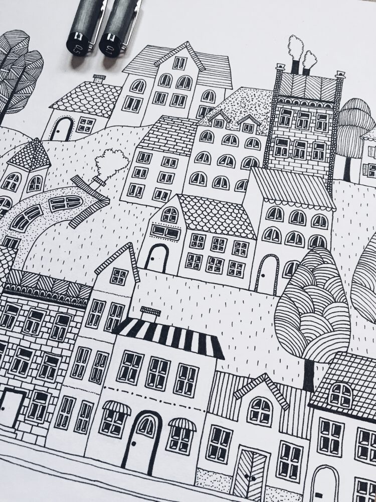 Illustration i tusch på en detaljerad stad med fantasifulla hus.
