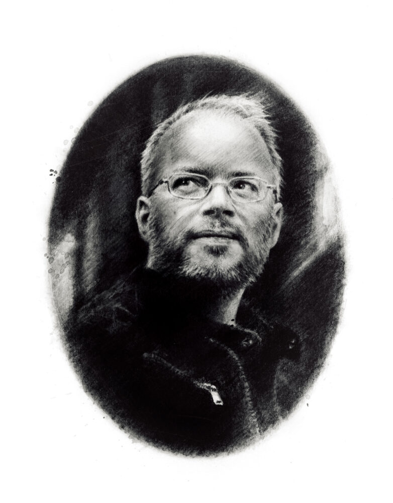 Porträtt av Johan Rundberg som tittar åt sidan