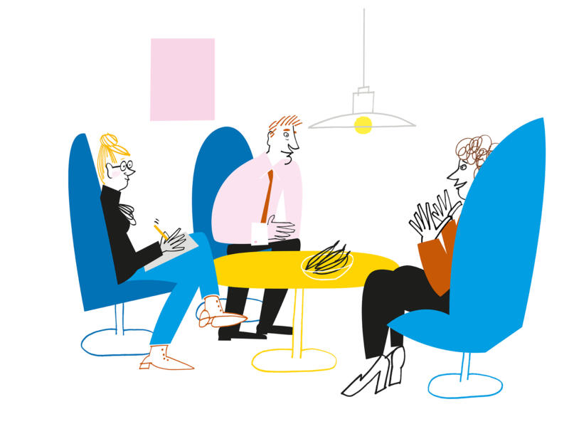 People having a meeting around table at work.