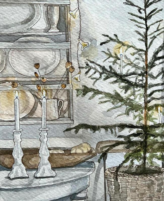 Del av vardagsrum med julgran och ljusstakar