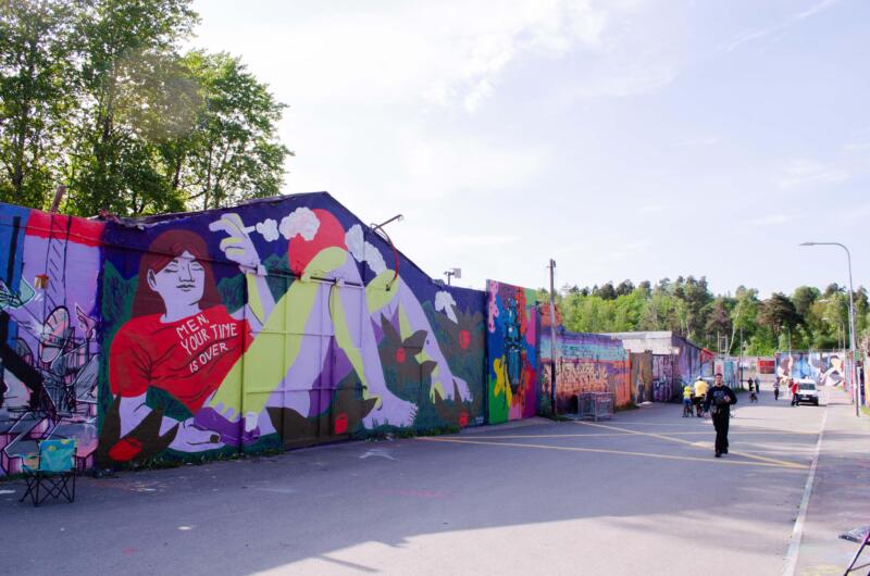 Mural of a woman with a satifyer, with a shirt saying 'Men, your time is over'