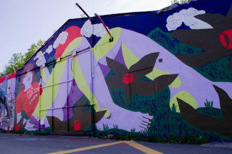 Mural of a woman with a satifyer, with a shirt saying 'Men, your time is over'