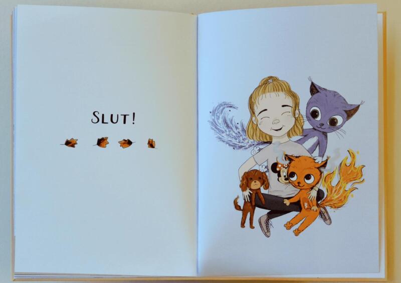 Sista sidan av boken Wilma och Drömdörren föreställande Wilma och hennes nya vänner som kramas