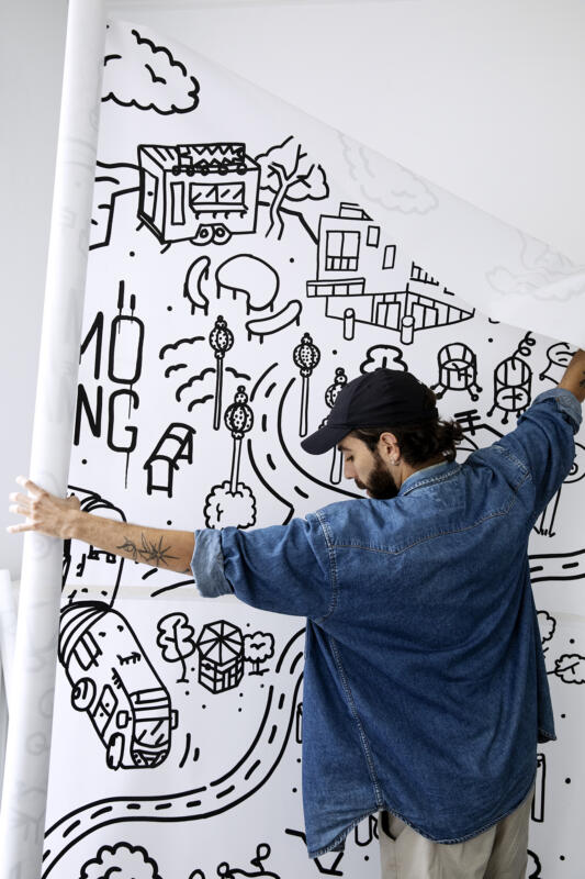 Artist Skinny Gonzales with canvas for Malmö in the making